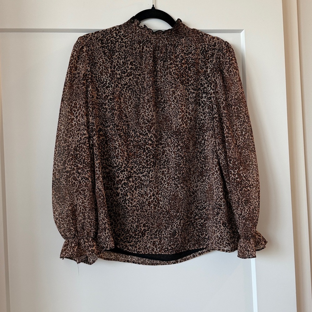1. State Animal Print Top with Smocked Detail
